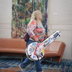 Moving fast with a banjo at World of Bluegrass 2016 - photo by Frank Baker