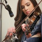 Charli Robertson with Flatt Lonesome on the Masters Stage at World of Bluegrass 2016 - photo by Frank Baker