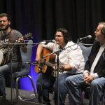 Justin Hiltner, Dawn Kenney, and David Morris sing in a songwriter showcase at Wide Open Bluegrass 2016 - photo by Frank Baker
