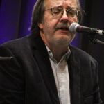 David Morris sings in a songwriter showcase at Wide Open Bluegrass 2016 - photo by Frank Baker