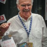 Terry Baucom having a laugh in the Exhibit Hall during Wide Open Bluegrass 2016 - photo by Frank Baker