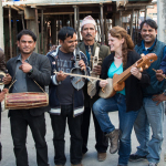 Tara trying out the almost extinct nepalese instrument called the arboj in a spontaneous jam session on the roof - photo by Tara Linhardt