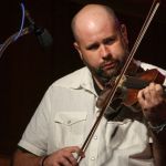 Justen Haynes with IIIrd Tyme Out at the May 2016 Gettysburg Bluegrass Festival - photo by Frank Baker