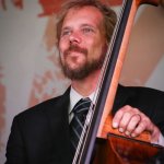 Mike Barber with The Gibson Brothers at the Gettysburg Bluegrass Festival (August 2014) - photo by Frank Baker