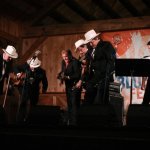 Earls Of Leicester looking for Charlie's fingerpick on stage at the Gettysburg Bluegrass Festival (May 2015) - photo by Frank Baker