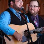Dustin Myrtle and Josh Swift with Doyle Lawson & Quicksilver at the August 2015 Gettysburg Bluegrass Festival - photo by Frank Baker