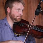Adam Haynes with The Grascals at the 2015 August Gettysburg Bluegrass Festival - photo by Frank Baker