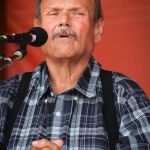 James King singing with Seldom Scene at the August Gettysburg Bluegrass Festival - photo by Frank Baker