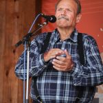 James King singing with Seldom Scene at the August Gettysburg Bluegrass Festival - photo by Frank Baker