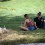 Relaxing in the shade at the August 2015 Gettysburg Bluegrass Festival - photo by Frank Baker