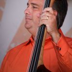 Mickey Harris with Rhonda Vincent & the Rage at the August 2015 Gettysburg Bluegrass Festival - photo by Frank Baker