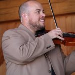 Evan McGregor with Joe Mullins & the Radio Ramblers at the August 2013 Gettysburg Bluegrass Festival - photo by Frank Baker