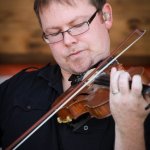Jim VanCleve with Mountain Heart at the August 2013 Gettysburg Bluegrass Festival - photo by Frank Baker