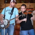 Barry Abernathy and Jim VanCleve with Mountain Heart at the August 2013 Gettysburg Bluegrass Festival - photo by Frank Baker