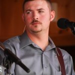 Justin Jenkins with Grasstowne at the August 2013 Gettysburg Bluegrass Festival - photo by Frank Baker