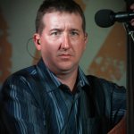 Jason Moore with Sideline at the August 2013 Gettysburg Bluegrass Festival - photo by Frank Baker