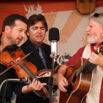 Travelin' McCourys with Bill Nershi at the August 2013 Gettysburg Bluegrass Festival - photo by Frank Baker