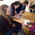 Gold Heart signing autographs for fans in Germany during their 2015 European tour