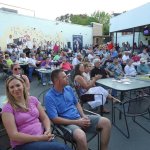 Audience enjoying The Grass Cats at Mac's Tavern