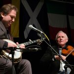 Jens Kruger and Byron Berline at Guthrie 2013 - photo by Tom Dunning