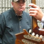 Niall Toner watching Flatt Lonesome at World of Bluegrass 2012 - photo by Woody Edwards