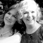 Christine Johnson and Debbie Midkiff, faithful Bluegrassians at Lil John Bluegrass Festival - photo © 2012 by Laura Tate Photography