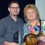 Ethan Burkhardt of Pinecastle with Lorraine Jordan at Lorraine's Coffee House & Music during World of Bluegrass 2015 - photo © Bill Warren