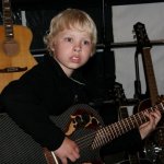 Isaac Moore jamming at the Fender booth at MerleFest 2013 - photo by Andy Garrigue