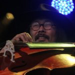 Joe Kwon with The Avett Brothers at MerleFest 2013 - photo by Andy Garrigue