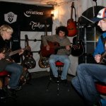 The Moore Brothers jamming at the Fender booth at MerleFest 2013 - photo by Andy Garrigue