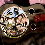 Jerry Douglas flashes the crowd at Merlefest 2012 - photo © Jason Lombard