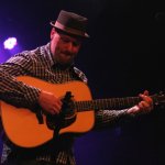 Stephen Mougin with Sam Bush at MerleFest 2013 - photo by Andy Garrigue