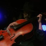 Joe Kwon with The Avett Brothers at MerleFest 2013 - photo by Andy Garrigue