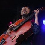 Joe Kwon with The Avett Brothers at MerleFest 2013 - photo by Andy Garrigue
