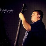 Kyle Perkins with JD Crowe at the South Carolina State Bluegrass Festival (11/23/12) - photo by Laura Tate Photography