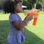 Blowing bubbles at the 2015 Norris Creek Pig Pickin' Bluegrass & BBQ Festival - photo © Laura Tate Photography
