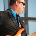 Corey Hensley with Doyle Lawson at the Outer Banks Bluegrass Festival - photo by Woody Edwards