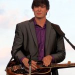 Brent Burke with Rhonda VincentRhonda Vincent & The Rage at the Outer Banks Bluegrass Festival - photo by Woody Edwards