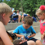 Enjoying the music at the 2016 Pickin' By The Lake Festival - photo by Laura Tate Photography