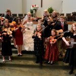 Rachel Johnson Boyd with her fiddle students - photo by Ted Lehmann