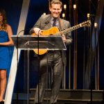 Bryan Sutton accepts Guitar Player of the Year on the 2014 IBMA Awards show - photo by Todd Powers