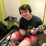 Grant Rigney laying down mandolin at Dark Shadow Recording