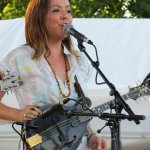 Jenny Lynn Gardner with Della Mae at ROMP 2013 - photo by Terry Herd