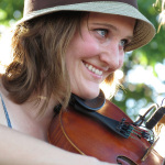 Kimber Ludiker with Della Mae at ROMP 2013 - photo by Terry Herd