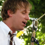 Phil Barker with Town Mountain at ROMP 2013 - photo by Terry Herd