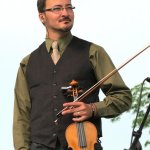 Jason Barie with Doyle Lawson & Quisksilver at ROMP 2014 - photo by Terry Herd