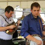 Darin Aldridge and Matt Love warming up before their set at Red, White & Bluegrass 2012 - photo © Laura Tate Photography
