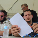 Darren Nicholson and Caleb Smith of Balsam Range signing for fans at Red, White & Bluegrass 2012 - photo © Laura Tate Photography
