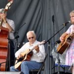Tom Gray, Eddie Adcock and Martha Adcock at Red, White & Bluegrass 2013 - photo by Bill Warren