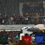 Larry Cordle & Lonesome Standard Time brave the deluge at Red, White & Bluegrass 2013 - photo by Bill Warren